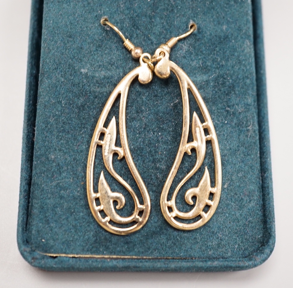 A modern 9ct gold pierced scroll drop earrings, 41mm, 6.1 grams.